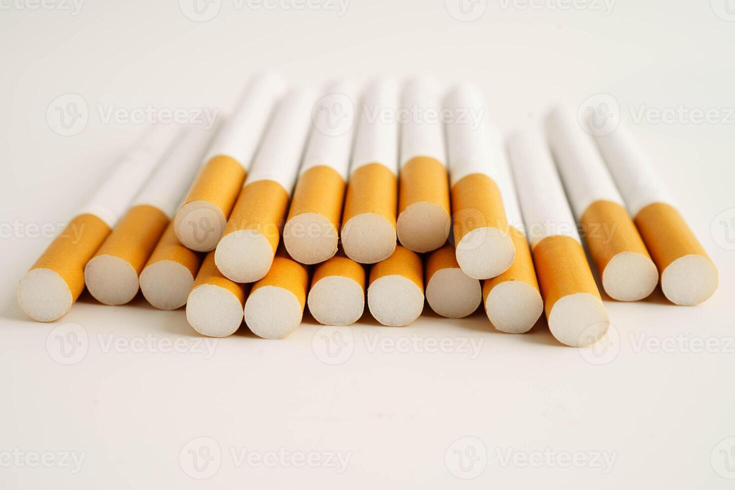 Cigarette, roll tobacco in paper with filter tube, No smoking. photo
