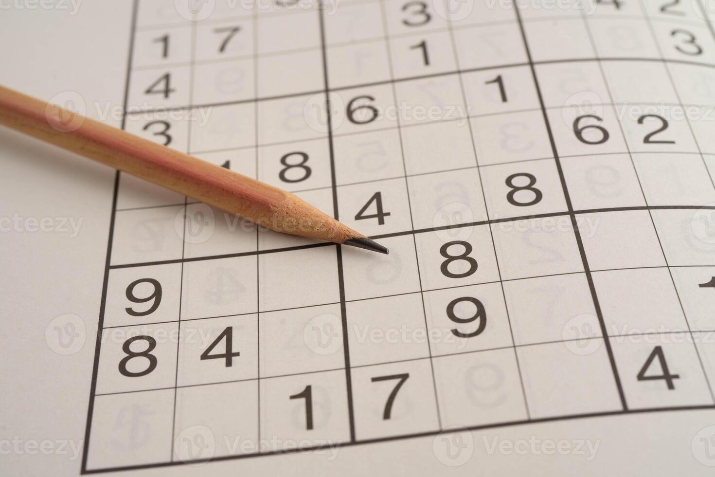 Sudoku puzzle, game to play for keep you brain younger for developing Alzheimer disease in senior patient. photo