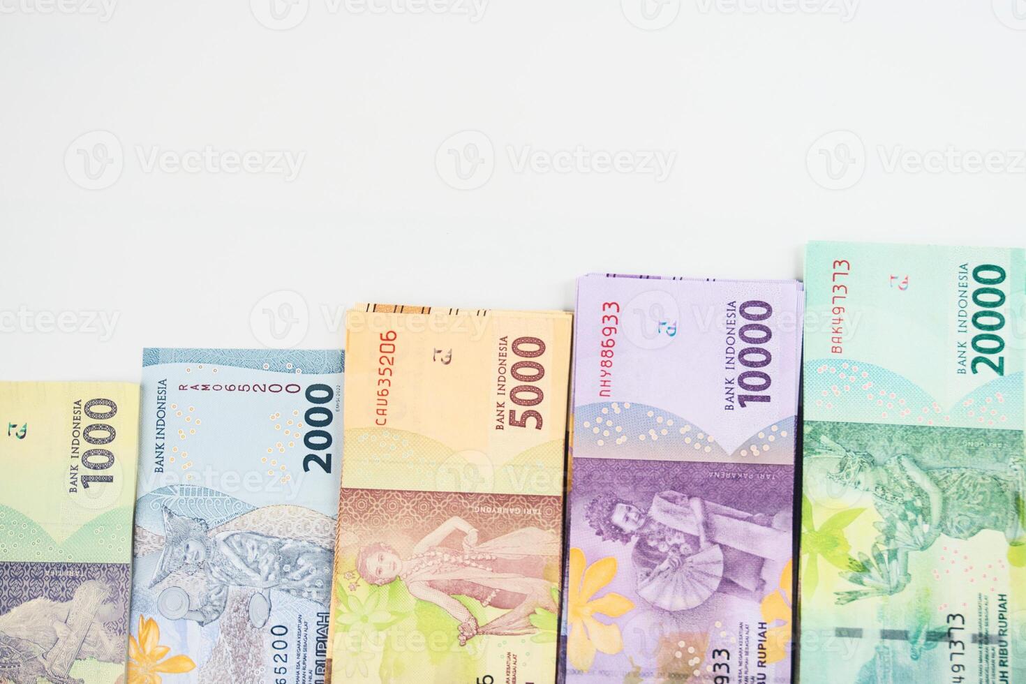 Colorful Indonesian Rupiah Banknotes Arranged in an Increasing Value Order photo
