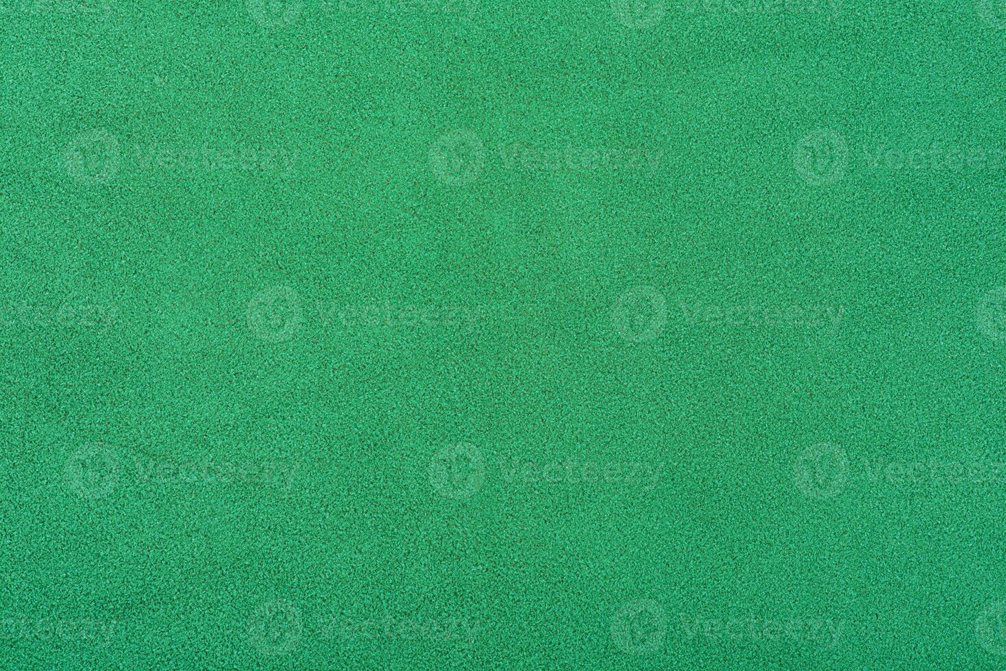 Green suede background macro photo. Green suede leather. photo