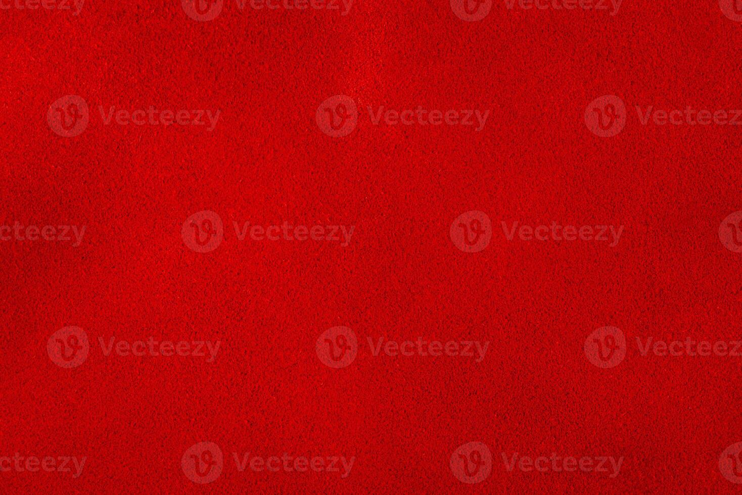 Red suede leather macro photo as background material for designers.