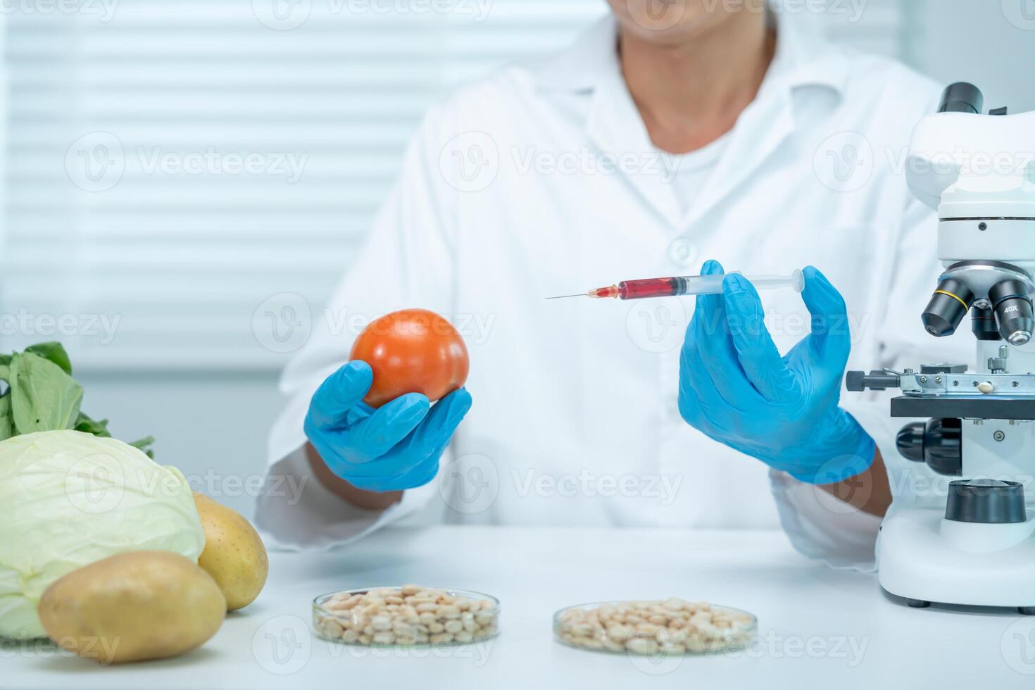 Scientist check chemical food residues in laboratory. Control experts inspect quality of fruit, scientists inject chemicals into apples for experiments, hazards, prohibited substance, contaminate photo