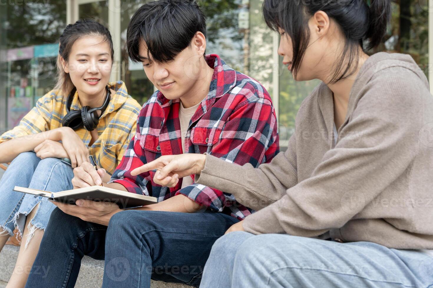 Group Asian student meeting team for work project. team happy study online. Read book in college campus. Group on international Asia University. Education, study, school, college, graduation photo
