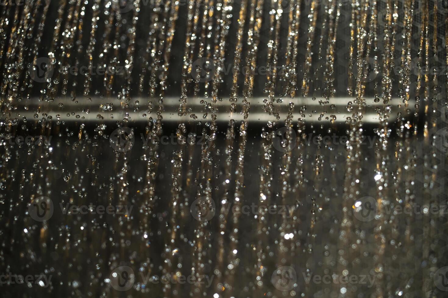 Beautiful cascading water droplets creating a stunning visual effect photo