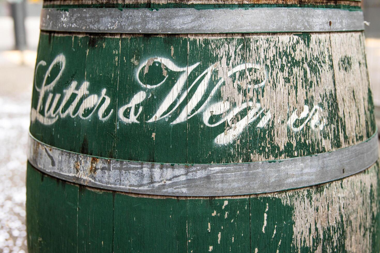 Berlin, Germany, January 5th, 2024. Detailed shot of a weathered barrel featuring Lutter and Wegner restauratnt logo, photographed in Berlin, Gendarmenmarkt. photo