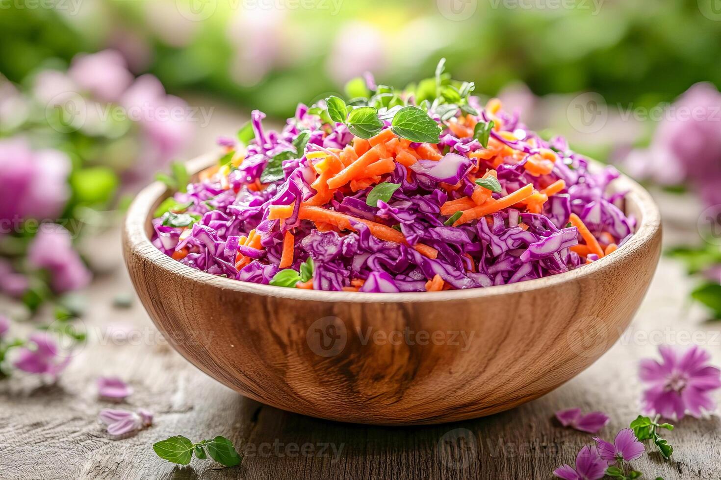 Spring vegetable salad with grated carrots and shredded purple cabbage. photo
