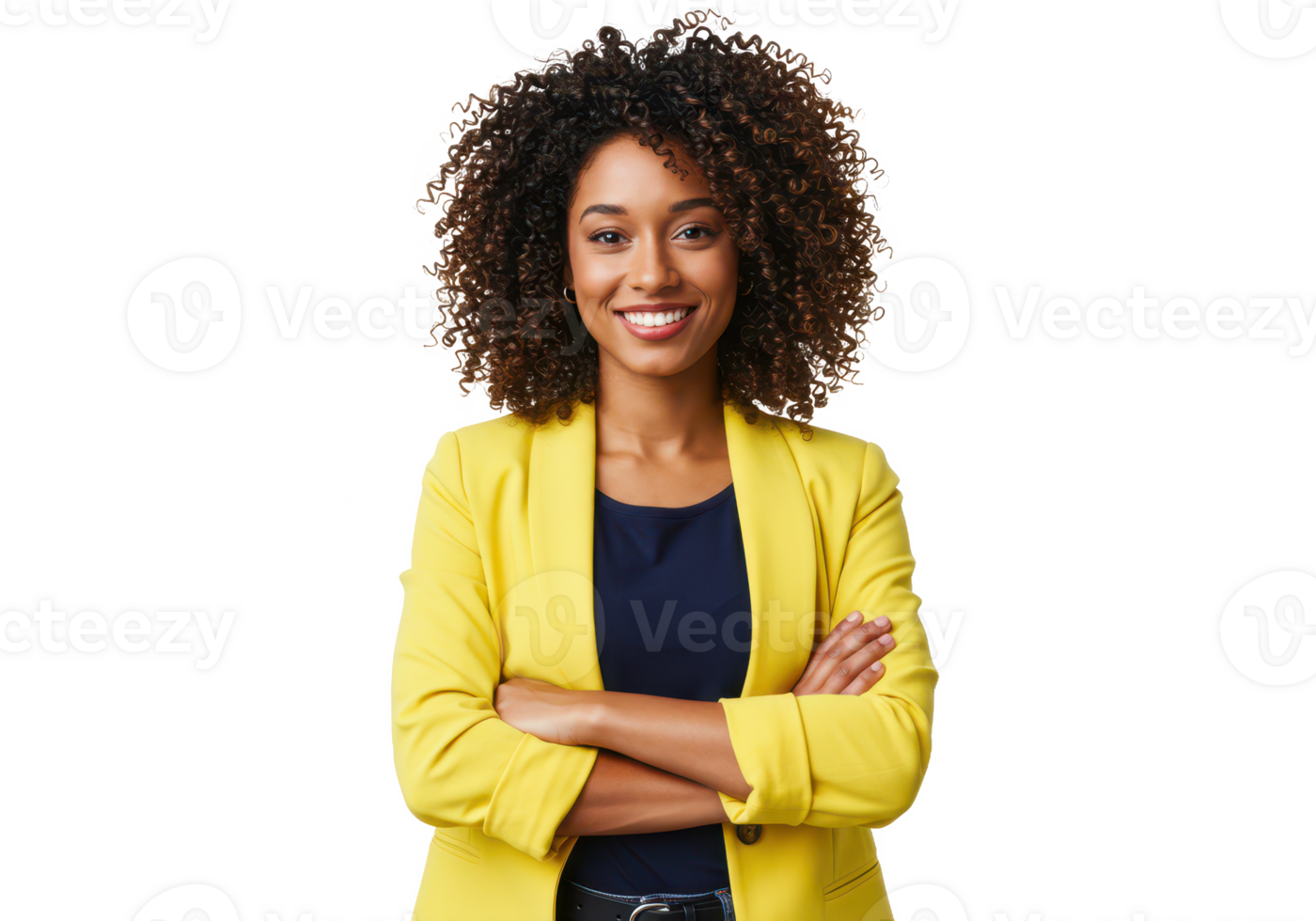 A confident woman with natural curly hair, wearing a bright yellow blazer and a navy top, standing with arms crossed isolated on transparent background png