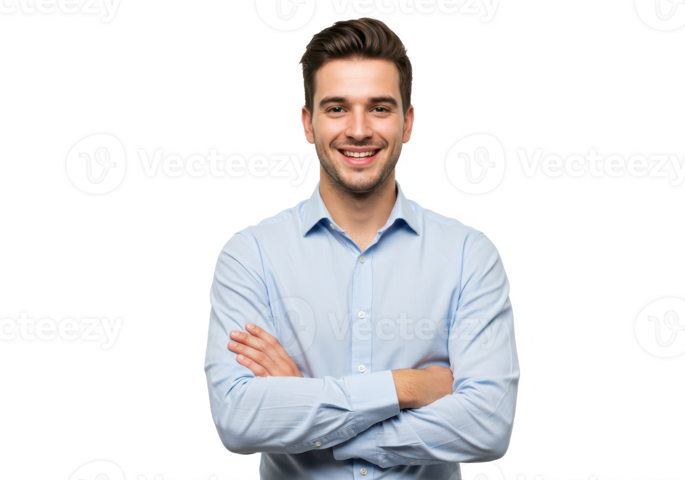 A professional young man with neatly styled hair, wearing a light blue shirt, standing with arms crossed and smiling warmly isolated on transparent background png