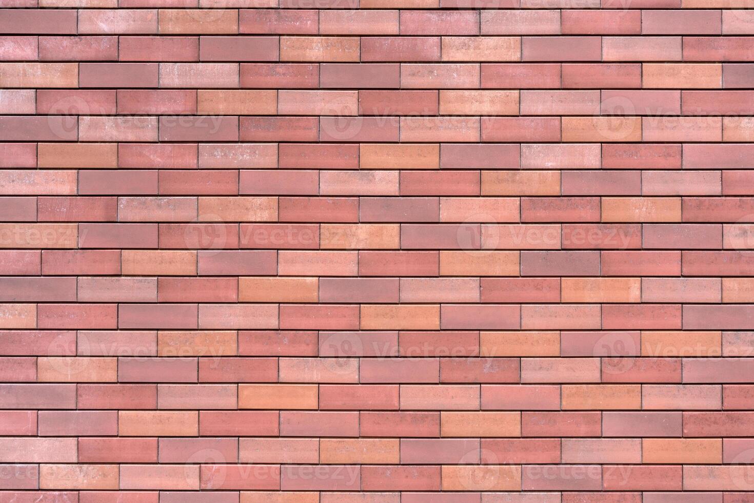 Brick wall of the building. Designer building background. photo