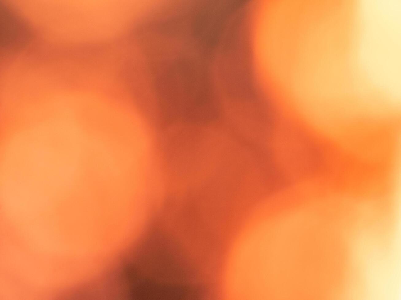 Orange bokeh from sunlight in the sky photo