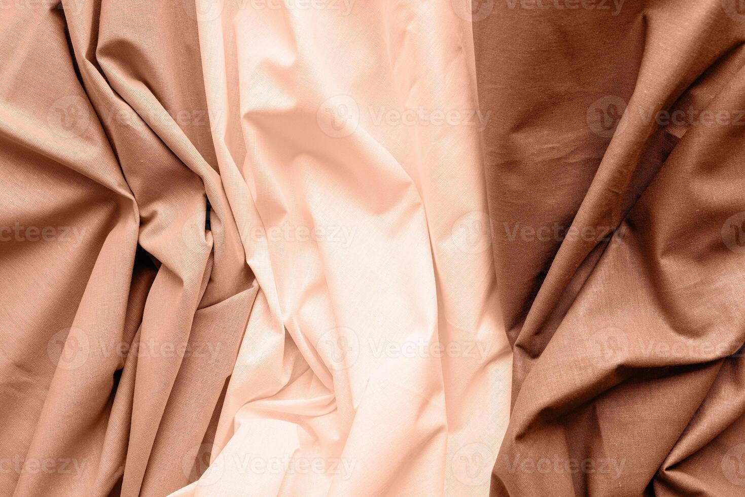 Mocha Mousse - color of the year 2025. Chocolate brown fabric texture background photo