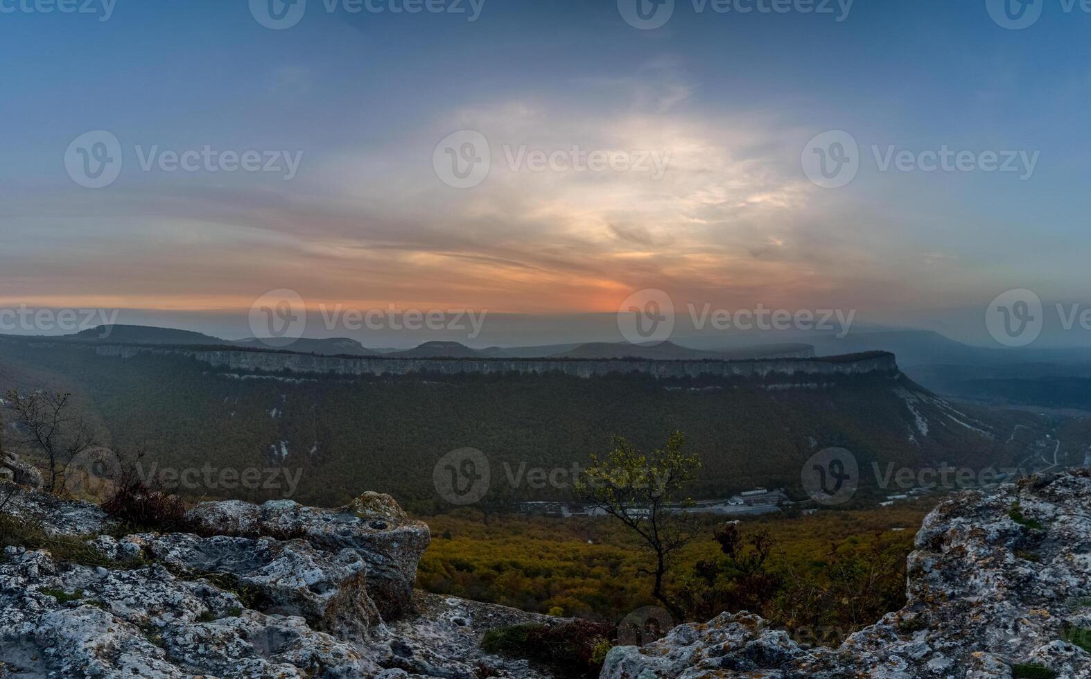 Mountains and forests of Crimea. coniferous and deciduous trees on the hills of mountains and rocks photo