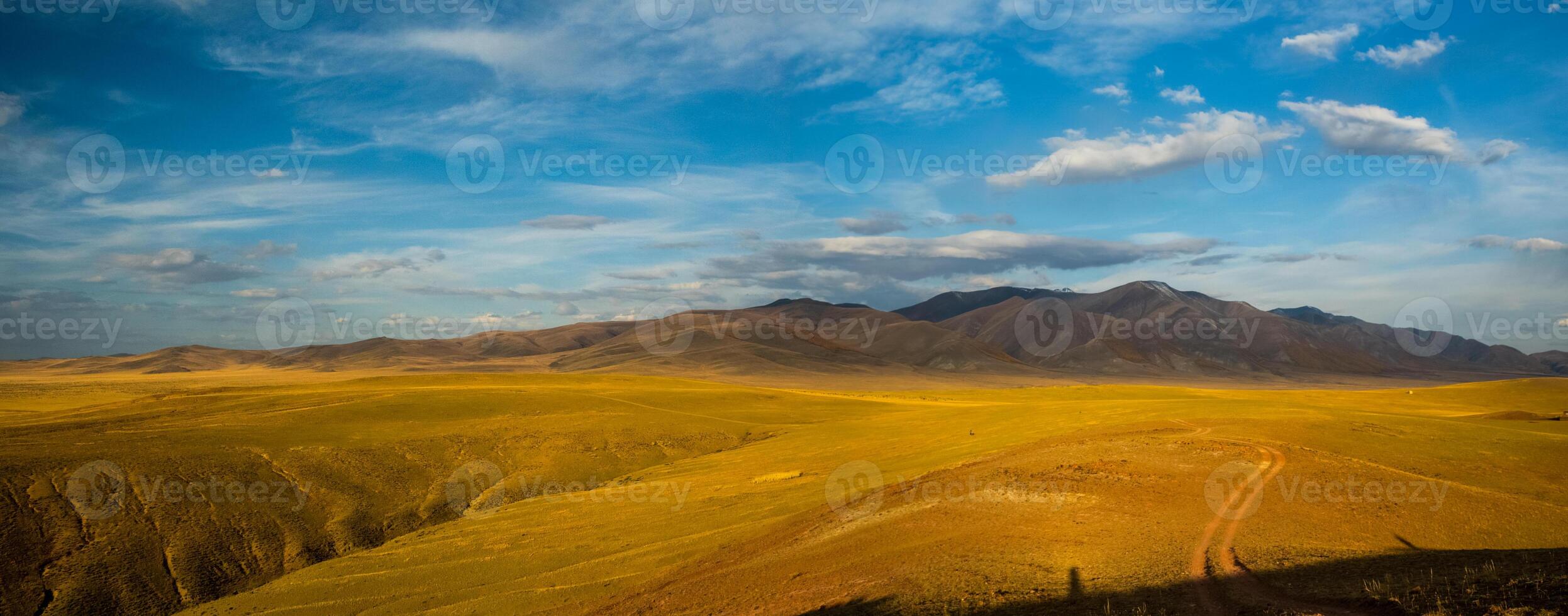 Mountains and hills altai in autumn, panoramic photo. photo