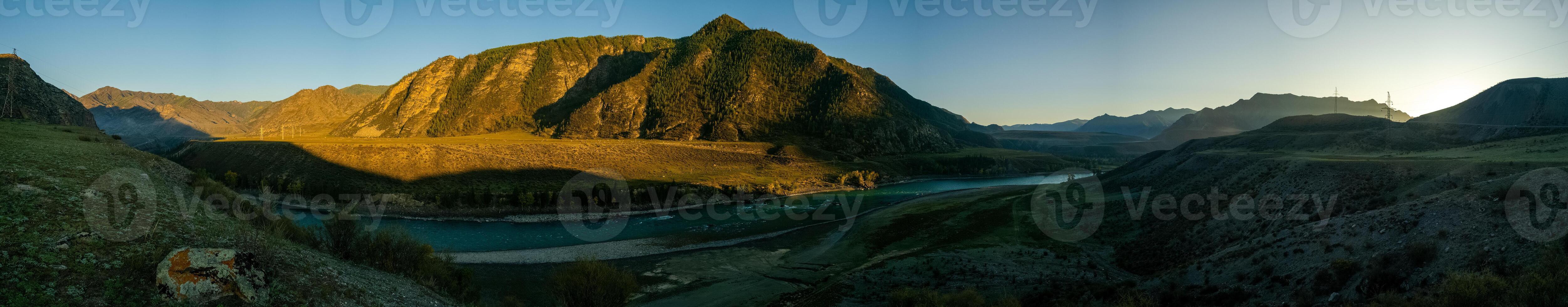 Panorama is Altai, a mountain river flowing between the Altai mountains and the nature of the area. photo