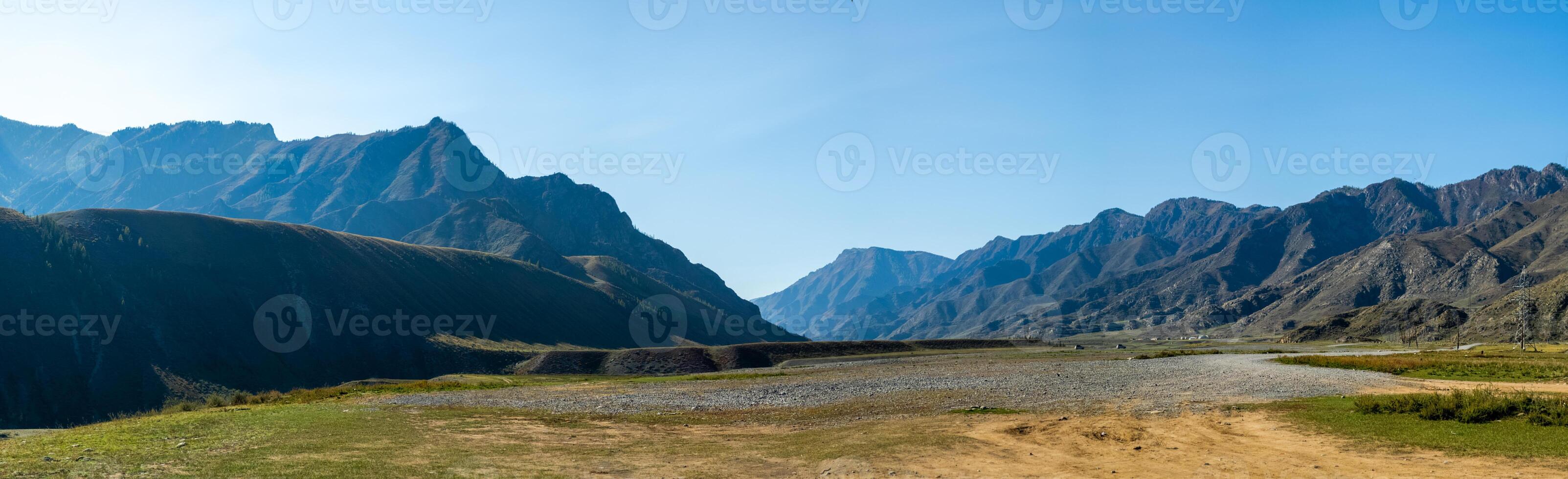 Panorama is Altai, a mountain river flowing between the Altai mountains and the nature of the area. photo