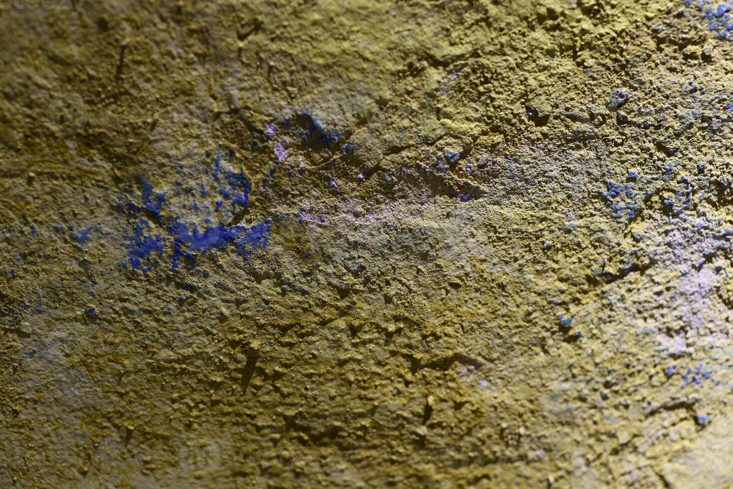 A visually striking textured surface that features captivating yellow and blue tones photo