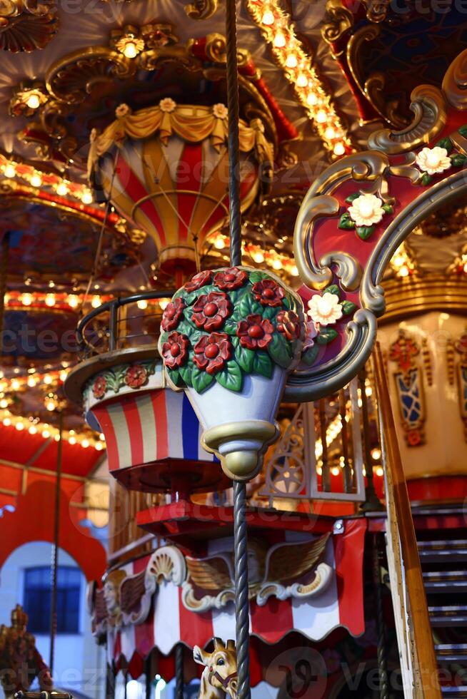An Elegant Carousel Design that exudes Vintage Charm combined with Bright, Attractive Lights photo