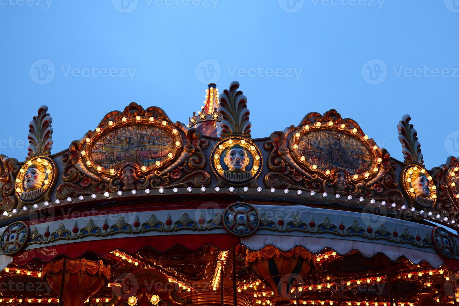 The Enchanting Carousel at Dusk A Dreamy Escape into a World of Whimsy and Delight photo