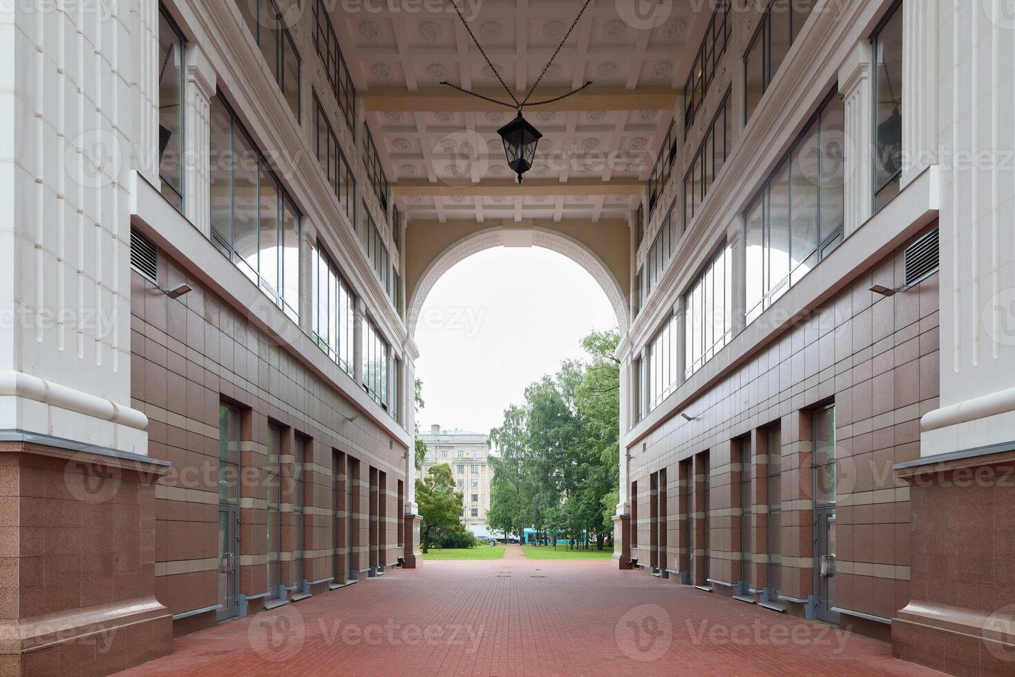 An Archway Framed by Elegant Architecture Surrounded by Lush Greenery and Natural Beauty photo