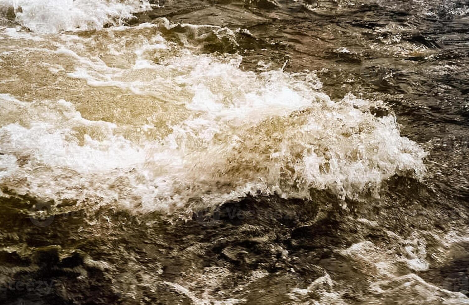Mountain river. Stones and water of mountain river. The mountains are said. photo