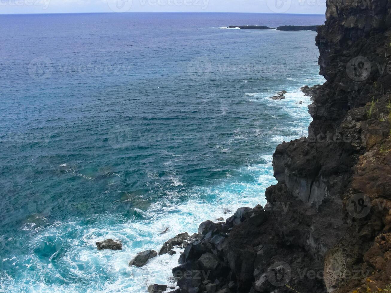 Easter Island coastline. Easter Island coast, rocks, ocean. photo