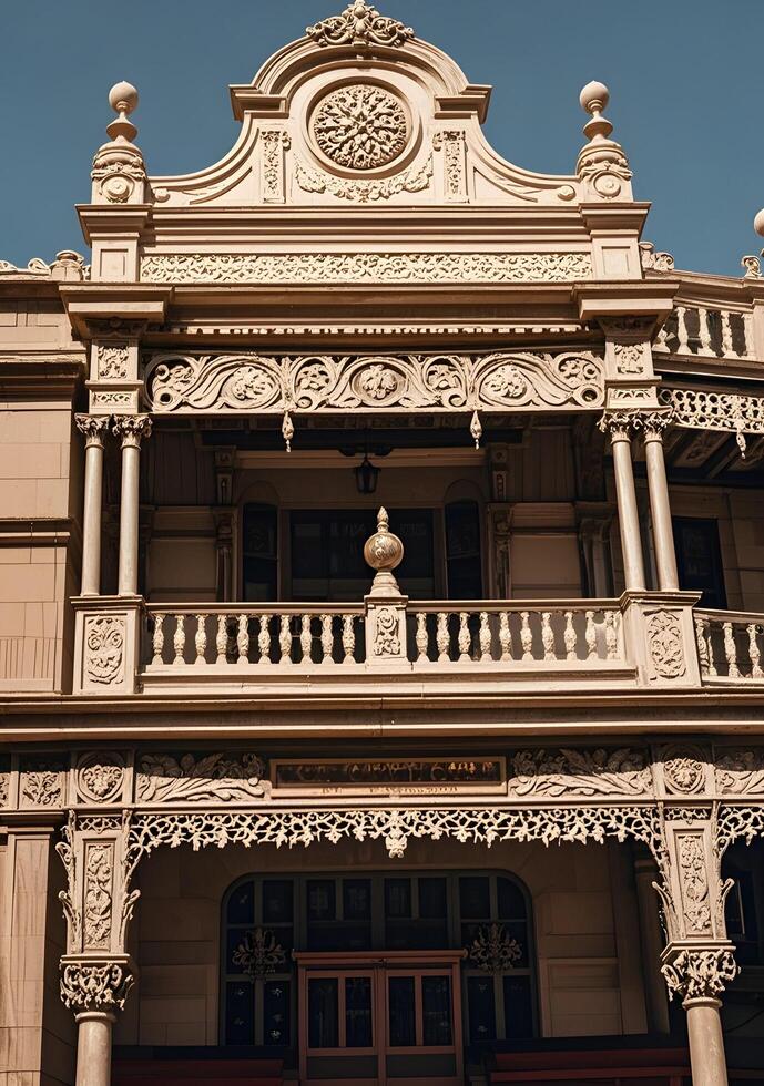 A building with ornate balconies and a clock on the front photo