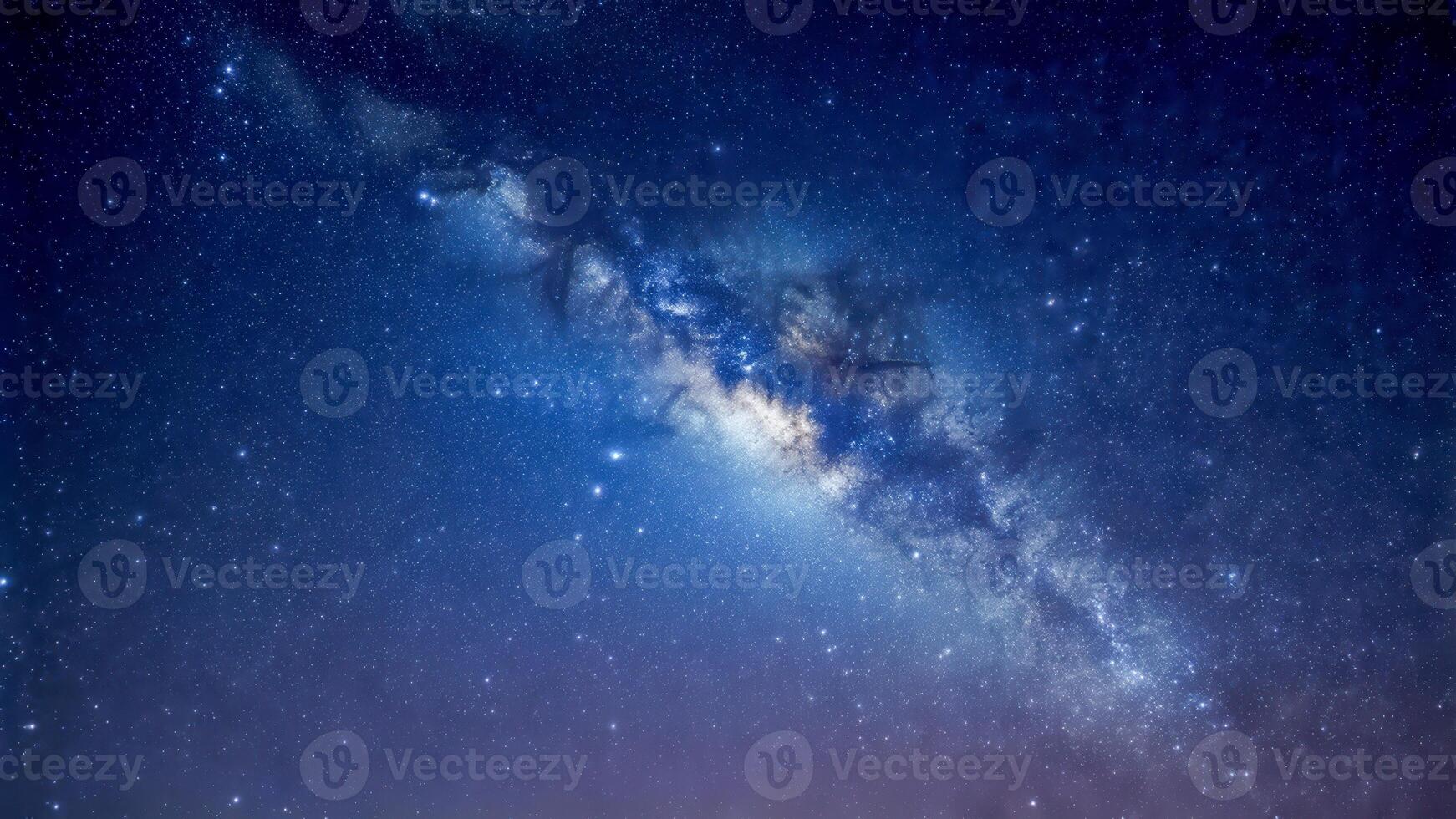 Spectacular view of the galaxy filled with stars and cosmic dust at night photo