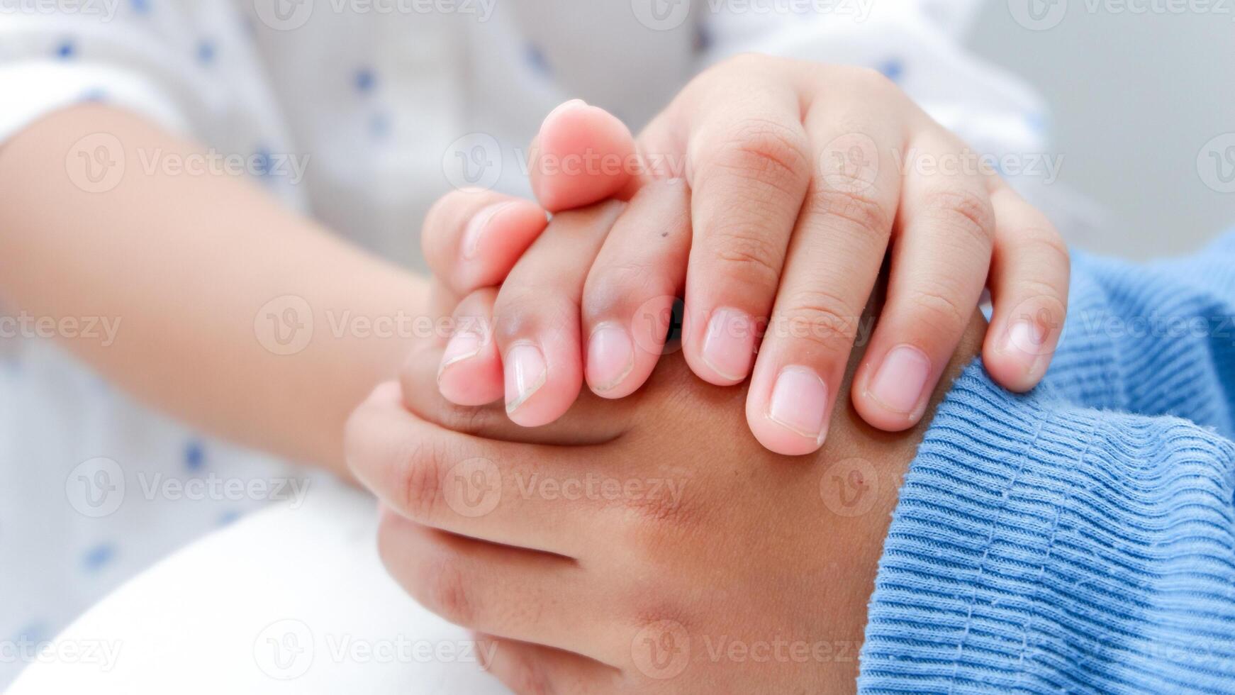 Children students hands stacking together for harmonious concept. couple of kids be in unity. Harmony teamwork circle of friendship concept. photo