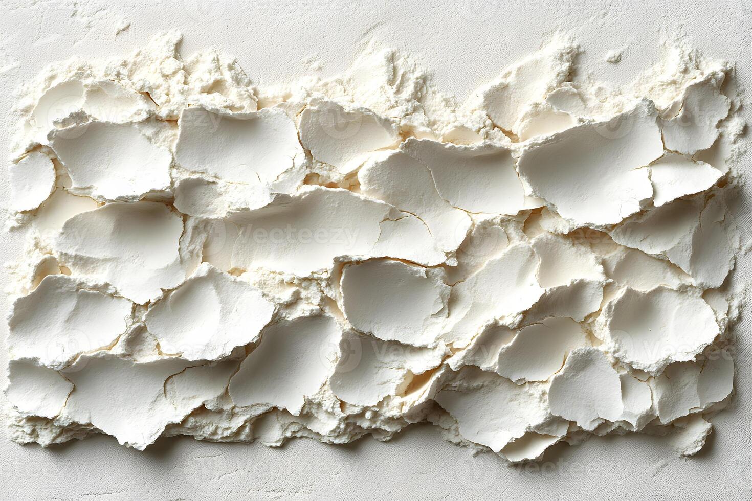 Textured Pattern of Cracked White Plaster on a Wall for Art and Design photo