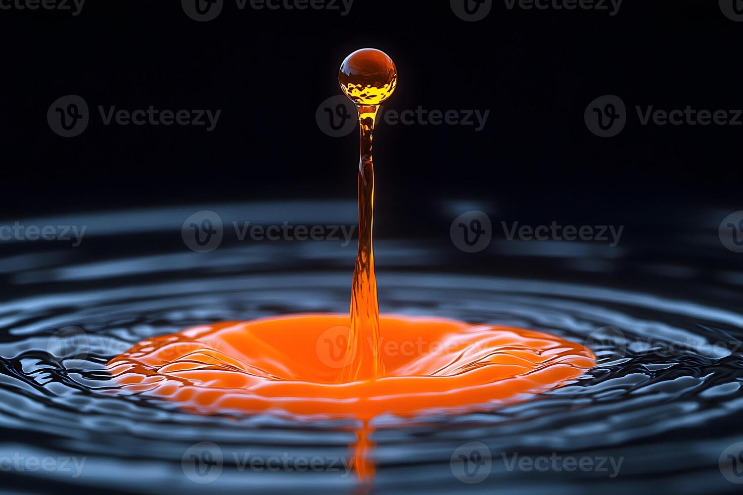 Vivid Orange Water Droplet Splash on Dark Reflective Surface for Abstract Art and Design Concepts photo