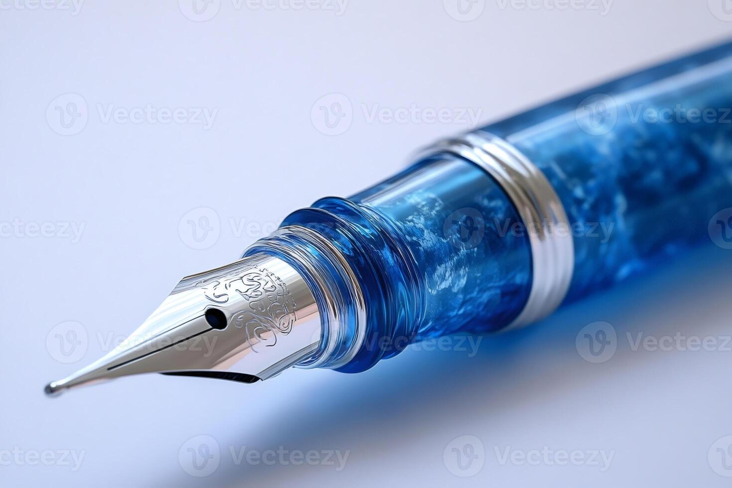 Elegant blue fountain pen nib showing writing craftsmanship photo