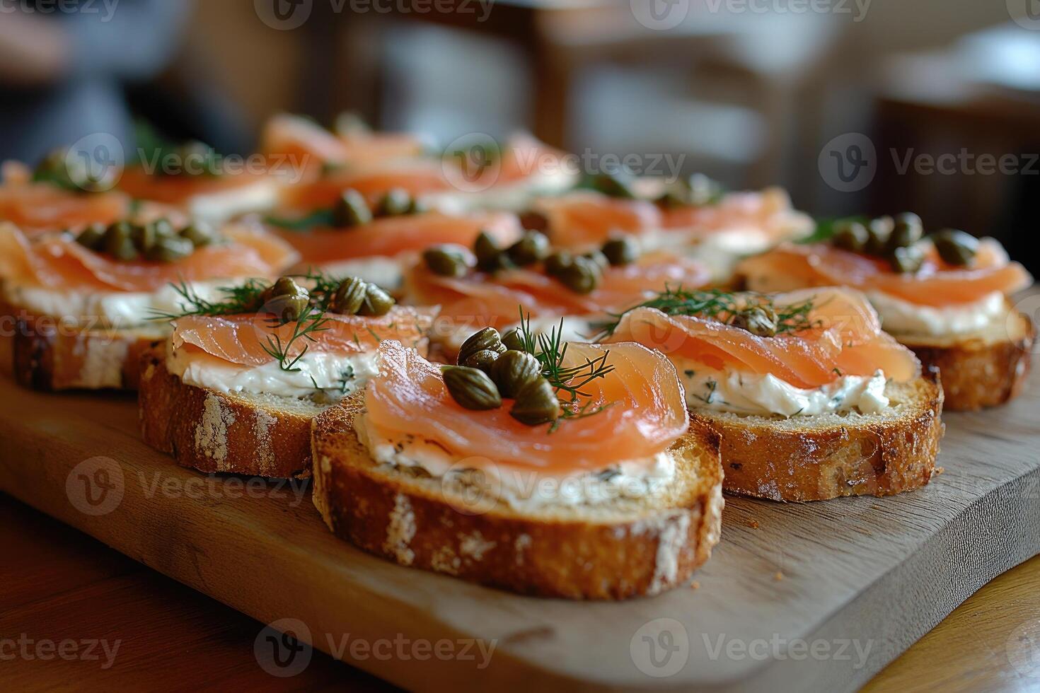 Delicious smoked salmon with cream cheese, capers, and dill on toasted baguette slices photo