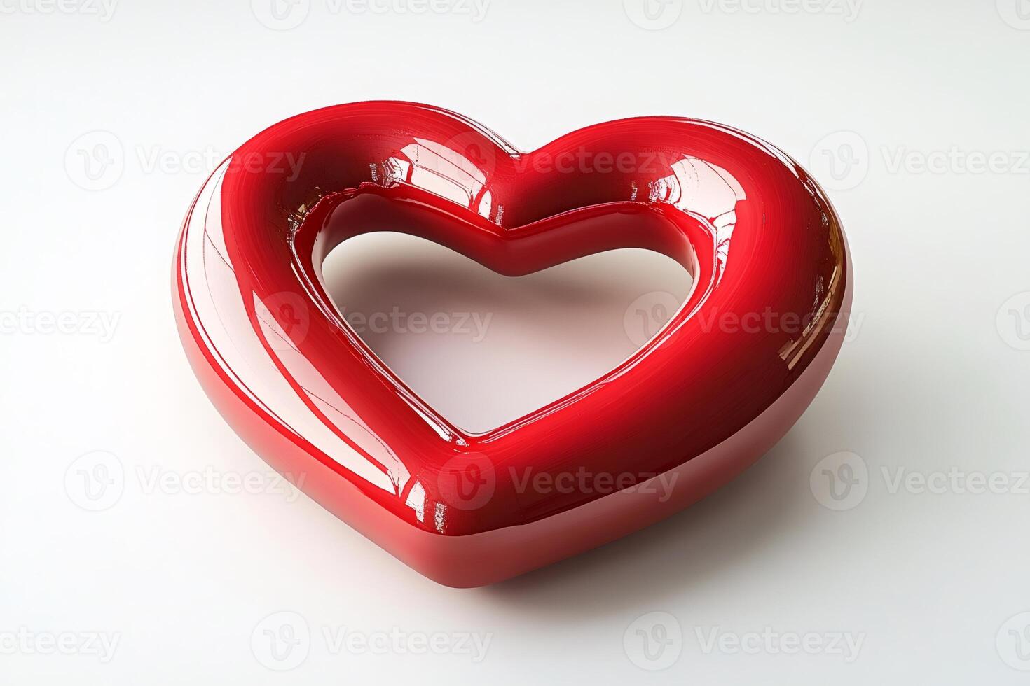 Glossy red heart symbolising love and romance on white background photo