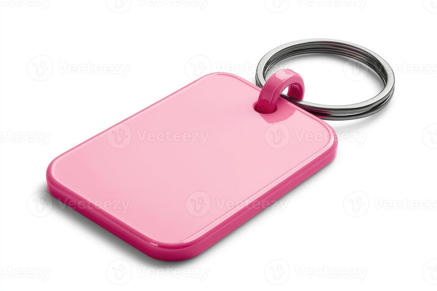 Pink rectangular keychain showing copy space for customization on white background photo