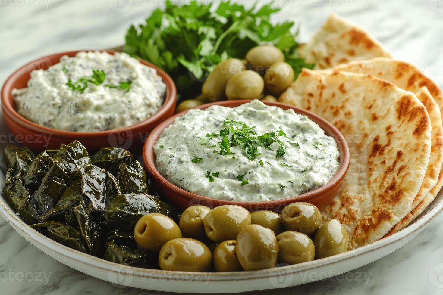 Spinach and feta dip sharing platter with pita bread photo