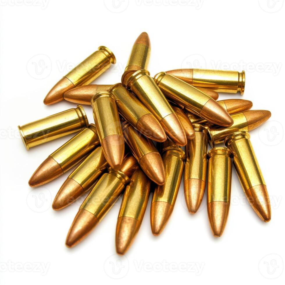 Collection of golden ammunition casings resting on a surface with a focus on detail and texture photo