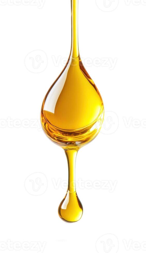 Golden liquid drips from a spoon highlighting smooth texture and vibrant color in a minimalist setting photo