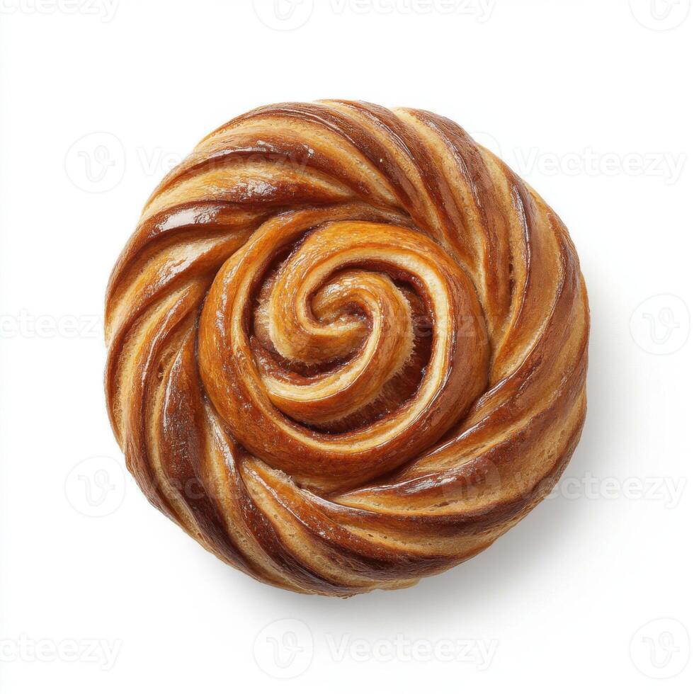 Swirled pastry with golden-brown sheen on a plain background showcasing intricate details and texture of the baked item photo