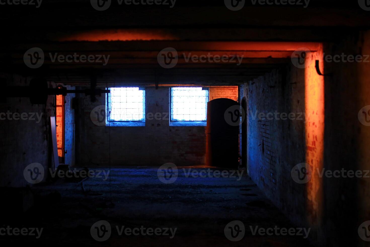 Grungy corridor with unusual daylight in blue and orange photo
