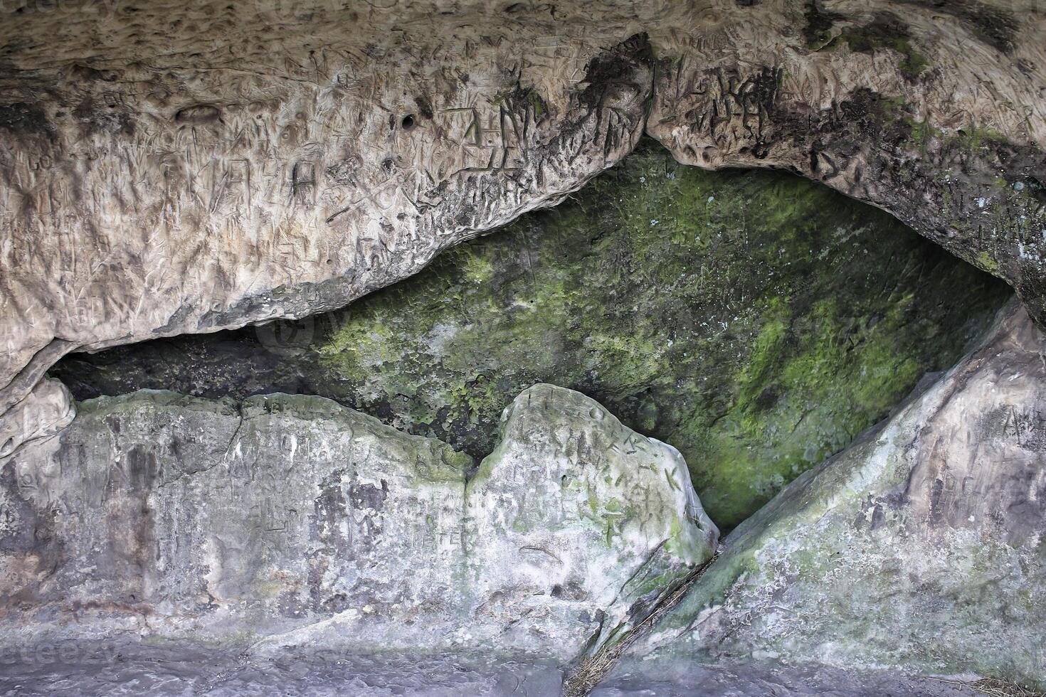 Broken wall in a cave with interesting shape photo