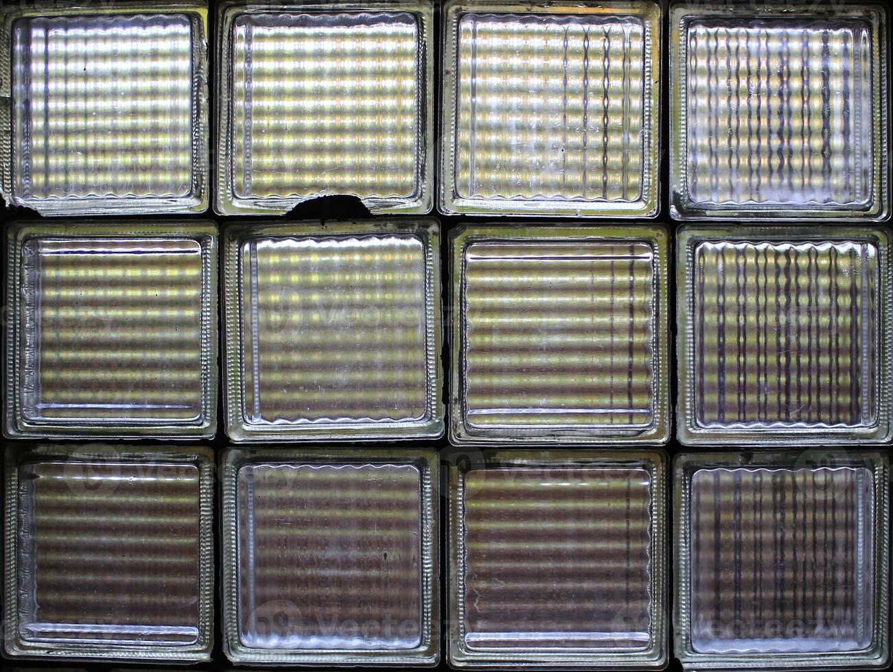 Old-fashioned square glass bricks instead of a window photo