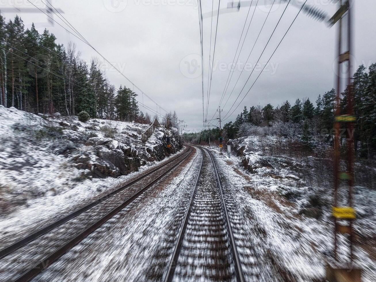 View from the back window of a Swedish high speed train photo
