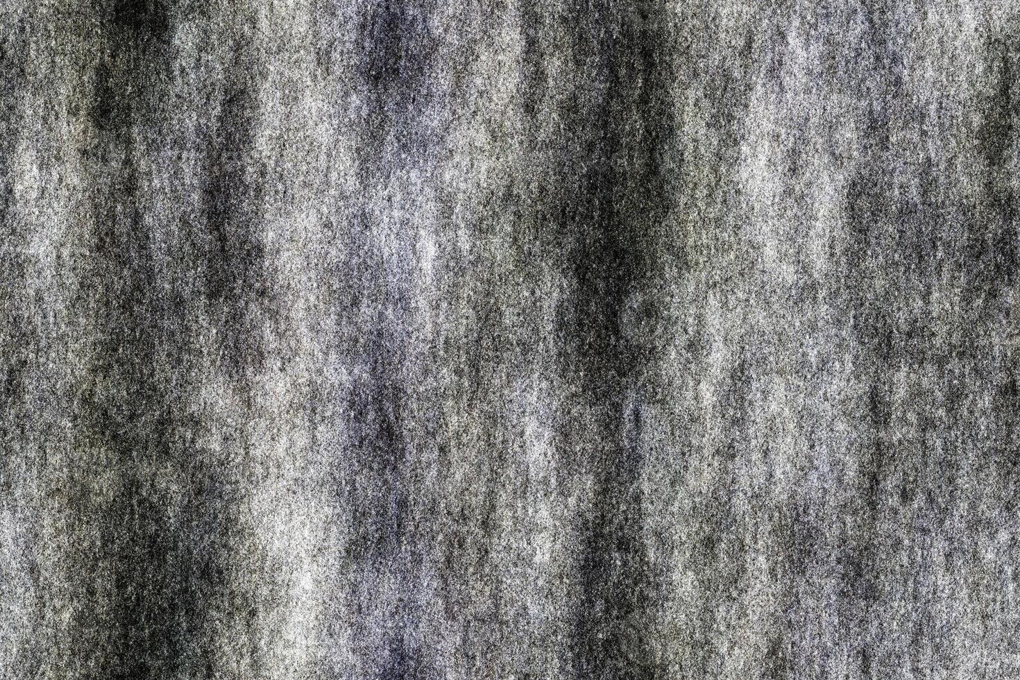 Seamlessly tileable gray texture made from concrete with subtle patterns creating an abstract and rugged appearance photo