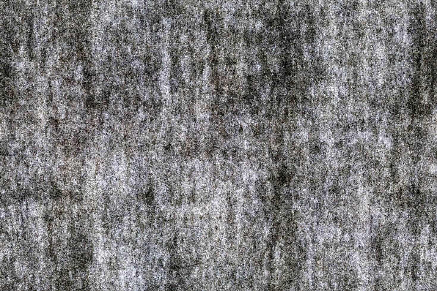 Seamlessly tileable gray texture made from concrete with subtle patterns creating an abstract and rugged appearance photo