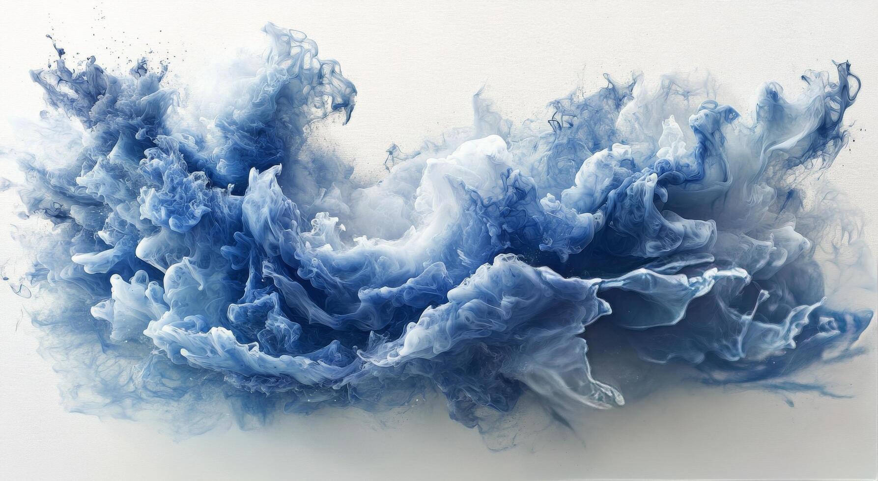 Blue ink swirling in water creating abstract shapes and patterns photo