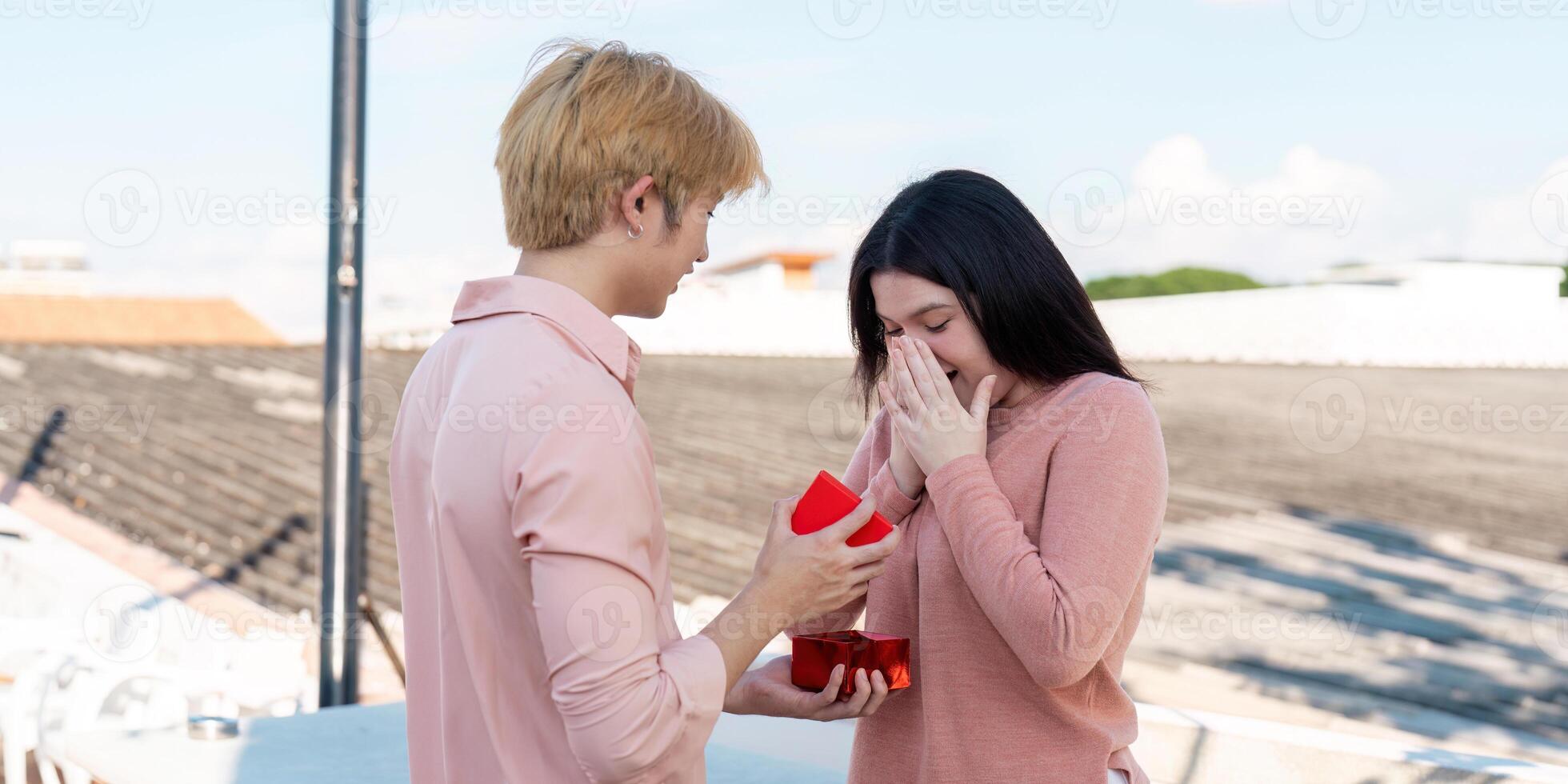 Romantic valentine proposal rooftop setting emotional couple beautiful sky intimate moment of love photo