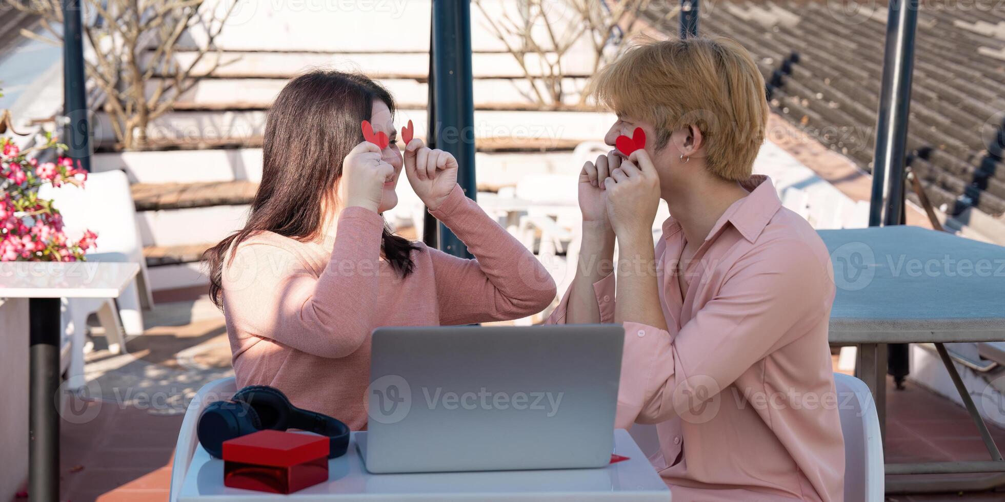 Playful valentine's day celebration for a couple cozy atmosphere with heart-shaped props romantic and joyful moments photo