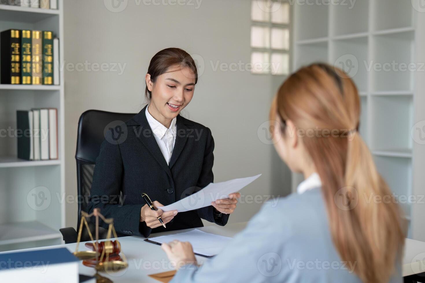 Lawyer client consultation office setting professional meeting modern environment engaging perspective client guidance photo