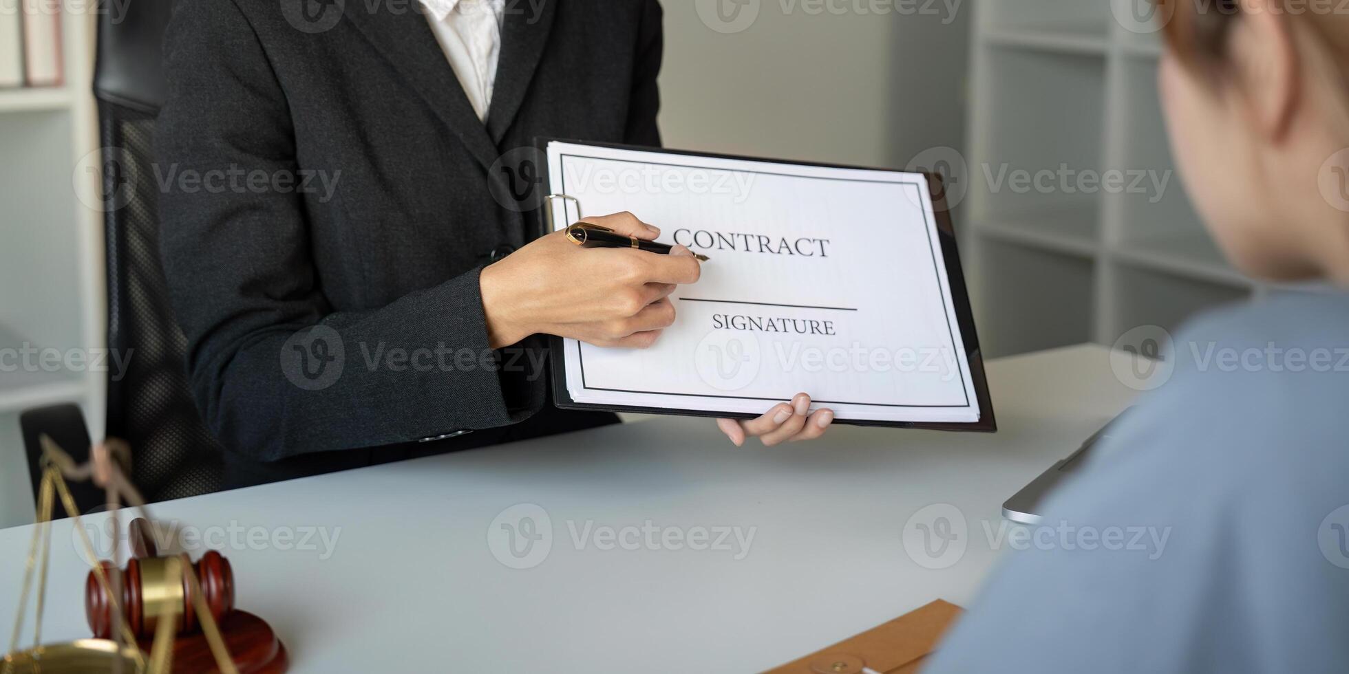 Lawyer signing contract in office environment business transaction professional setting close up view for legal clarity photo
