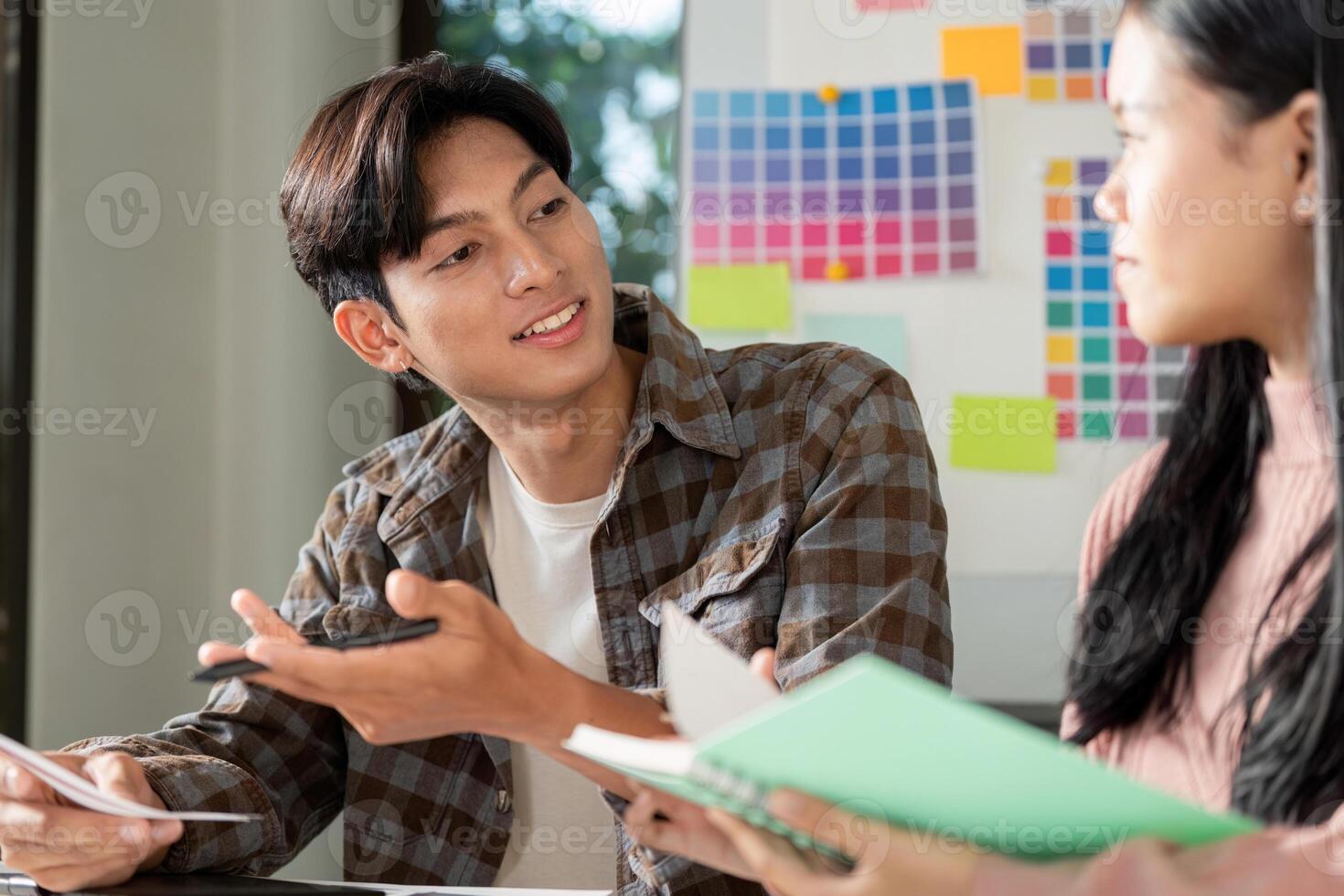 Creative team design session in modern office graphics collaboration environment photo